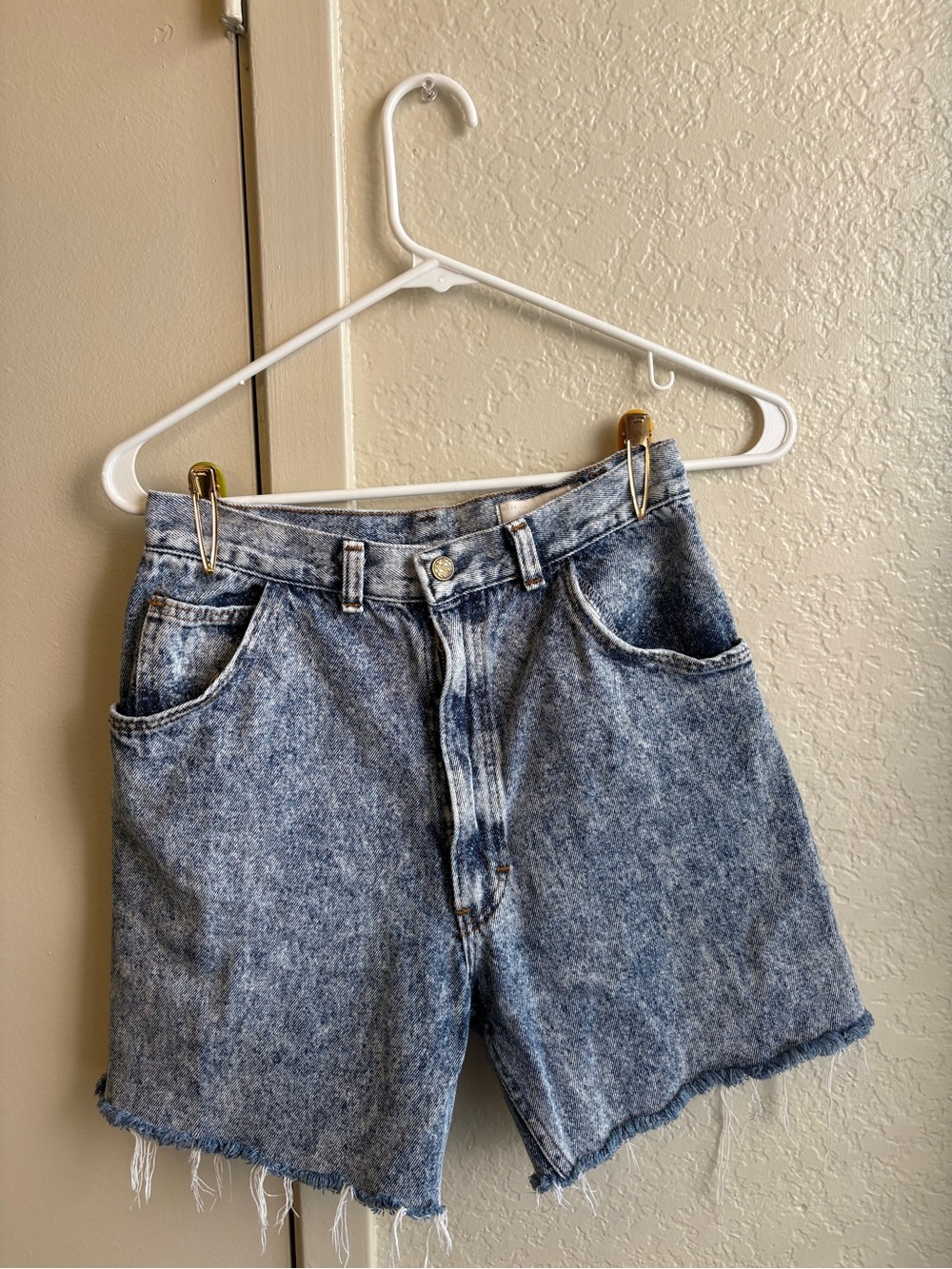 High-Rise Acid-Wash Denim Cut offs in Blue